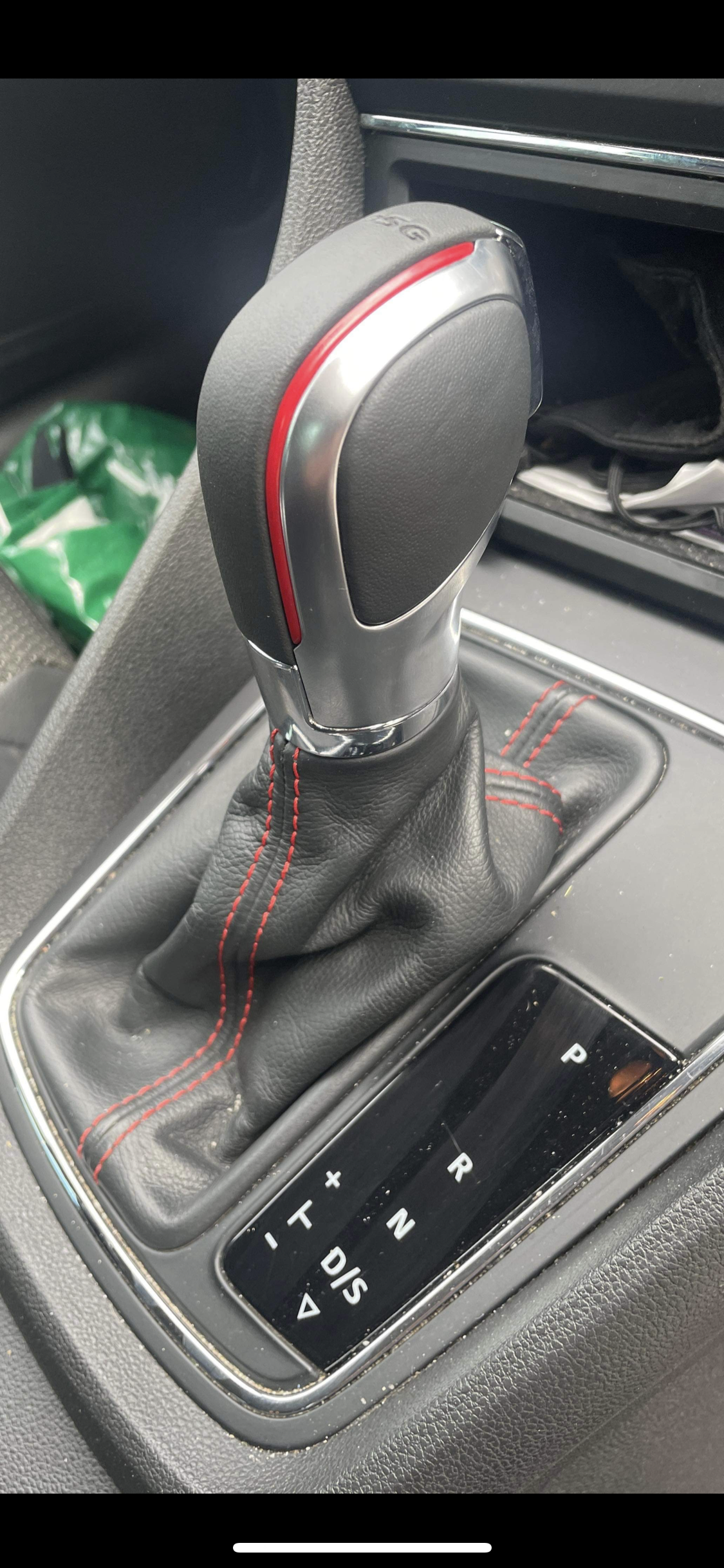 Automatic gear selector shifter with red accents
